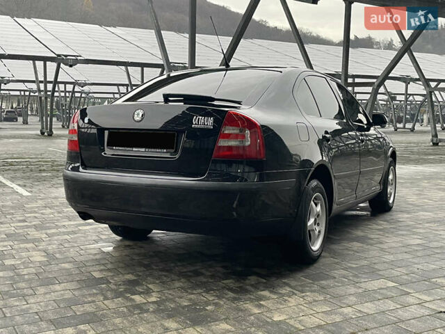 Чорний Шкода Октавія, об'ємом двигуна 1.6 л та пробігом 231 тис. км за 5350 $, фото 6 на Automoto.ua