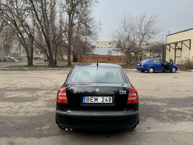 Черный Шкода Октавия, объемом двигателя 2 л и пробегом 149 тыс. км за 3350 $, фото 6 на Automoto.ua