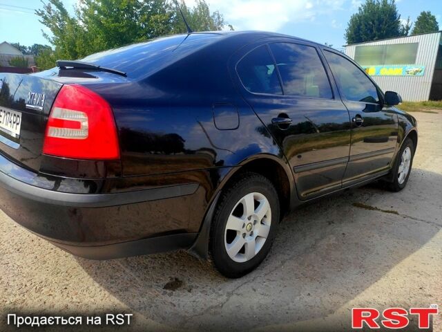 Черный Шкода Октавия, объемом двигателя 1.6 л и пробегом 212 тыс. км за 5700 $, фото 1 на Automoto.ua