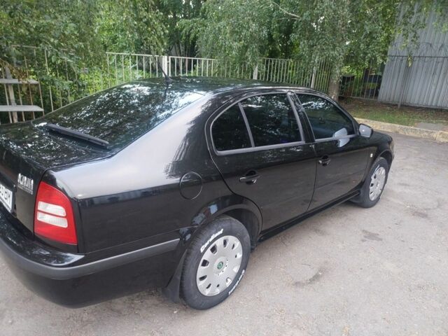 Черный Шкода Октавия, объемом двигателя 1.6 л и пробегом 177 тыс. км за 5800 $, фото 3 на Automoto.ua