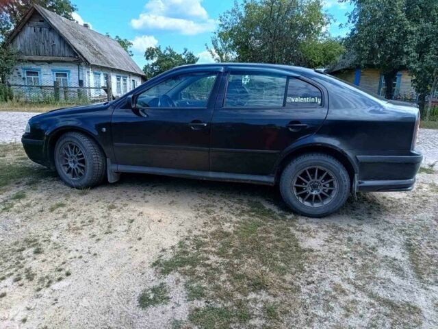 Черный Шкода Октавия, объемом двигателя 1.8 л и пробегом 290 тыс. км за 4500 $, фото 4 на Automoto.ua