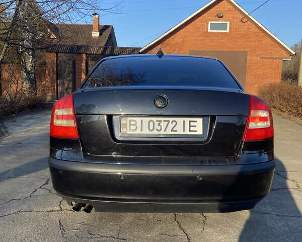 Чорний Шкода Октавія, об'ємом двигуна 1.98 л та пробігом 241 тис. км за 7500 $, фото 13 на Automoto.ua