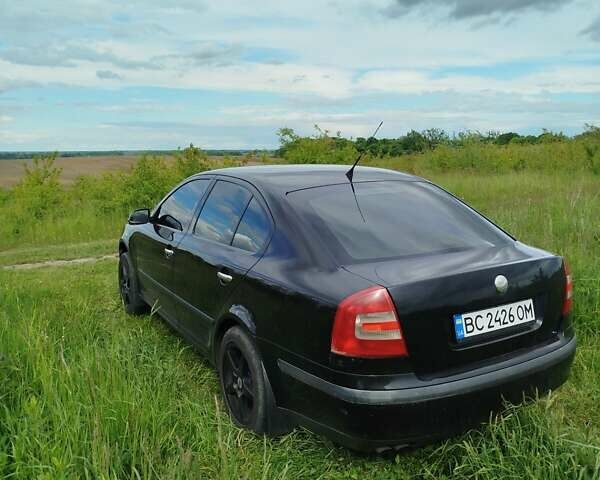 Черный Шкода Октавия, объемом двигателя 1.98 л и пробегом 493 тыс. км за 5600 $, фото 2 на Automoto.ua