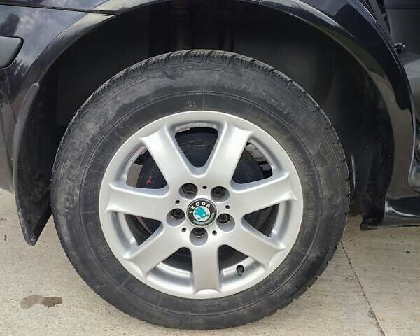 Черный Шкода Октавия, объемом двигателя 1.6 л и пробегом 232 тыс. км за 4850 $, фото 23 на Automoto.ua