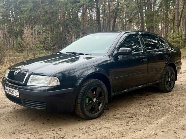 Черный Шкода Октавия, объемом двигателя 1.6 л и пробегом 286 тыс. км за 5500 $, фото 1 на Automoto.ua