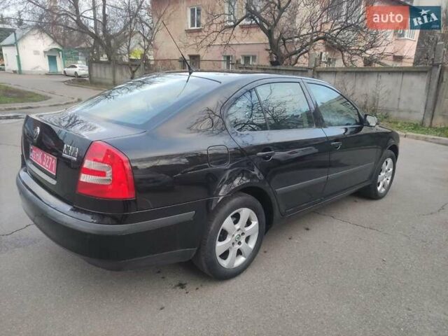 Черный Шкода Октавия, объемом двигателя 1.6 л и пробегом 198 тыс. км за 6999 $, фото 5 на Automoto.ua