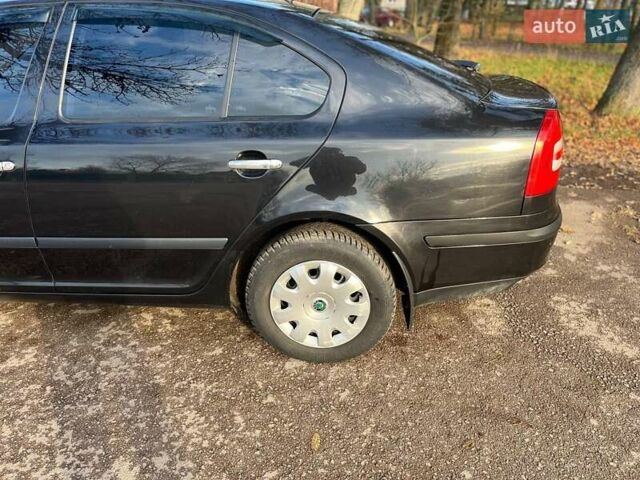 Черный Шкода Октавия, объемом двигателя 1.6 л и пробегом 210 тыс. км за 5900 $, фото 13 на Automoto.ua