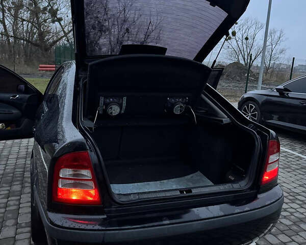 Черный Шкода Октавия, объемом двигателя 1.6 л и пробегом 245 тыс. км за 5400 $, фото 30 на Automoto.ua