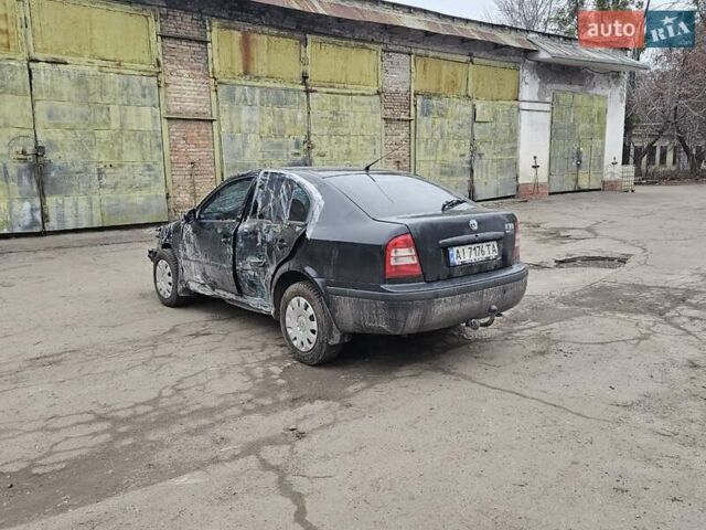 Черный Шкода Октавия, объемом двигателя 1.6 л и пробегом 210 тыс. км за 2350 $, фото 4 на Automoto.ua