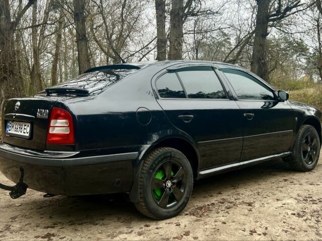 Черный Шкода Октавия, объемом двигателя 1.6 л и пробегом 286 тыс. км за 5500 $, фото 5 на Automoto.ua