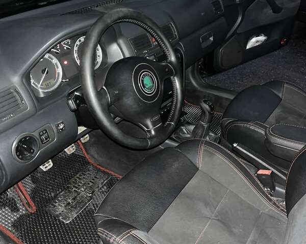 Черный Шкода Октавия, объемом двигателя 1.78 л и пробегом 240 тыс. км за 6500 $, фото 5 на Automoto.ua