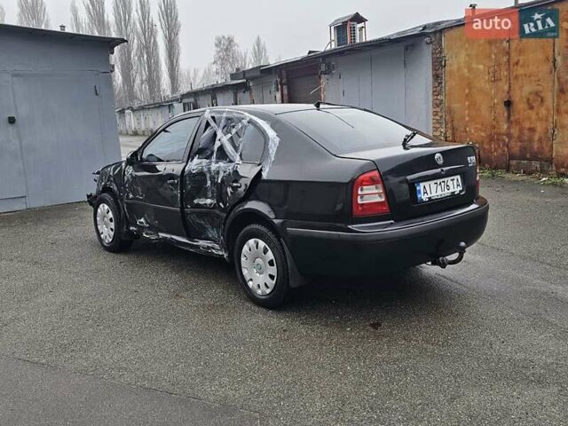 Черный Шкода Октавия, объемом двигателя 1.6 л и пробегом 210 тыс. км за 2200 $, фото 7 на Automoto.ua
