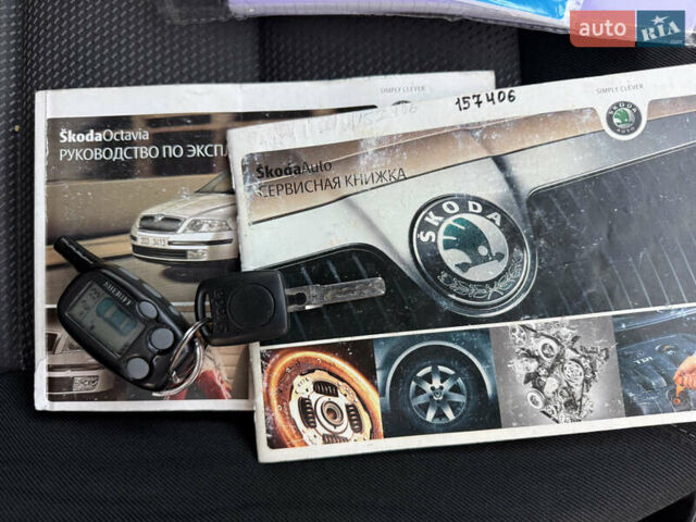 Черный Шкода Октавия, объемом двигателя 1.6 л и пробегом 297 тыс. км за 5500 $, фото 11 на Automoto.ua
