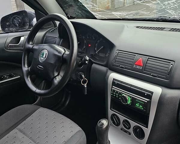 Черный Шкода Октавия, объемом двигателя 1.6 л и пробегом 210 тыс. км за 2200 $, фото 13 на Automoto.ua