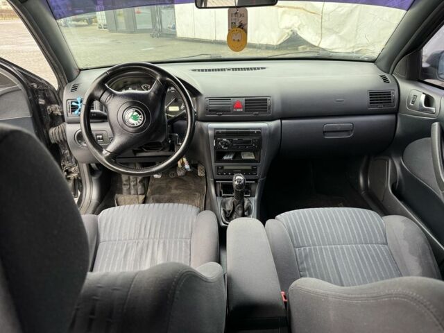 Черный Шкода Октавия, объемом двигателя 1.8 л и пробегом 355 тыс. км за 4700 $, фото 5 на Automoto.ua