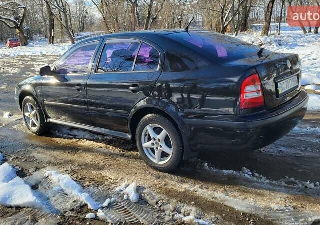 Черный Шкода Октавия, объемом двигателя 1.6 л и пробегом 230 тыс. км за 4800 $, фото 6 на Automoto.ua