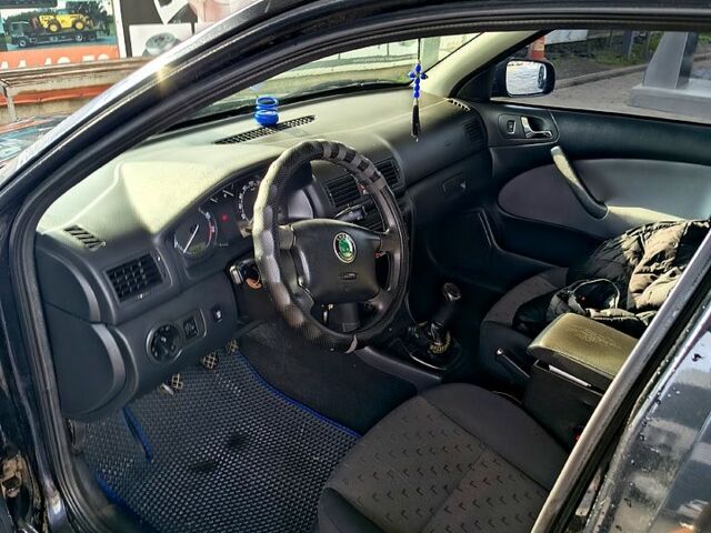 Черный Шкода Октавия, объемом двигателя 1.6 л и пробегом 172 тыс. км за 5999 $, фото 3 на Automoto.ua