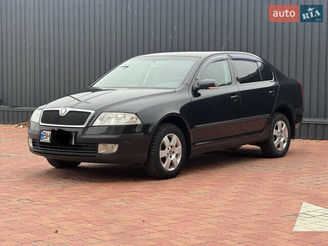 Черный Шкода Октавия, объемом двигателя 2 л и пробегом 230 тыс. км за 6950 $, фото 3 на Automoto.ua
