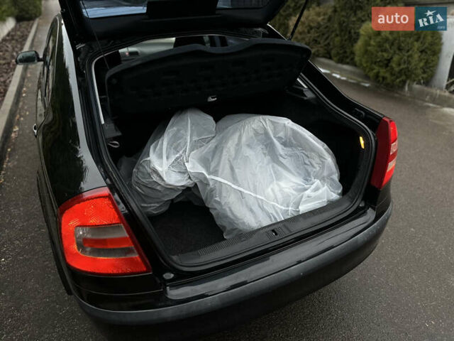 Черный Шкода Октавия, объемом двигателя 1.6 л и пробегом 223 тыс. км за 6300 $, фото 28 на Automoto.ua