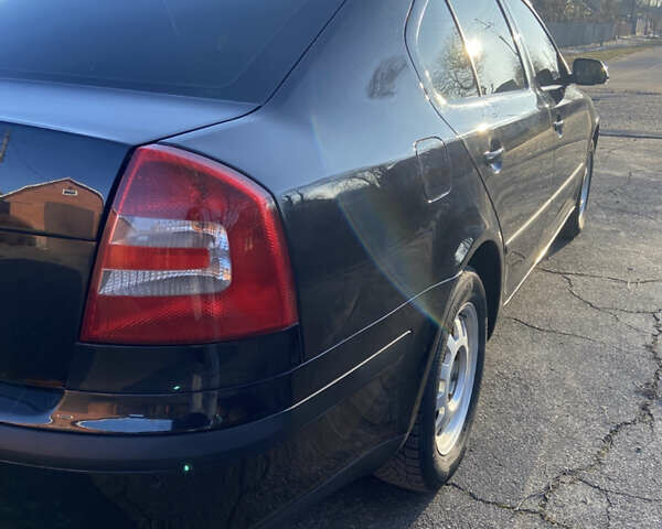 Чорний Шкода Октавія, об'ємом двигуна 1.98 л та пробігом 241 тис. км за 7500 $, фото 11 на Automoto.ua