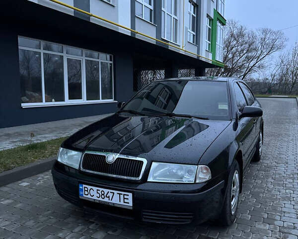 Черный Шкода Октавия, объемом двигателя 1.6 л и пробегом 245 тыс. км за 5400 $, фото 2 на Automoto.ua