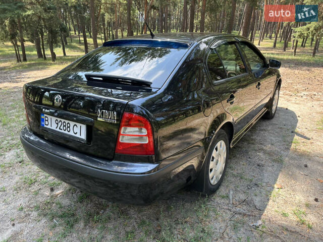 Черный Шкода Октавия, объемом двигателя 1.6 л и пробегом 200 тыс. км за 5800 $, фото 5 на Automoto.ua