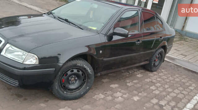 Черный Шкода Октавия, объемом двигателя 1.6 л и пробегом 250 тыс. км за 5700 $, фото 3 на Automoto.ua