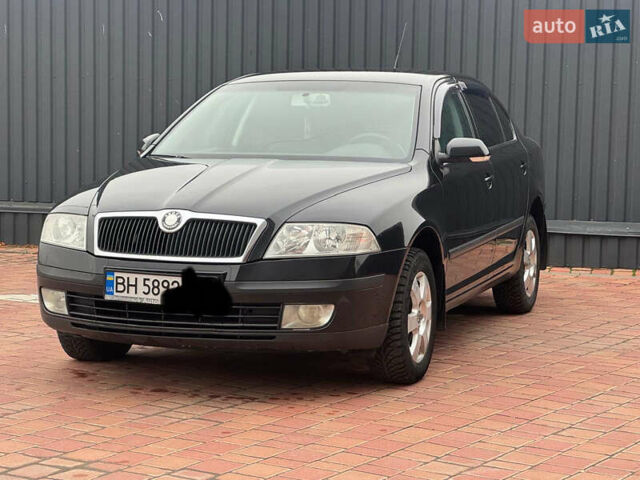 Черный Шкода Октавия, объемом двигателя 2 л и пробегом 230 тыс. км за 6950 $, фото 1 на Automoto.ua