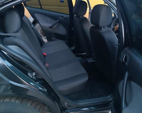 Черный Шкода Октавия, объемом двигателя 1.6 л и пробегом 431 тыс. км за 5500 $, фото 5 на Automoto.ua