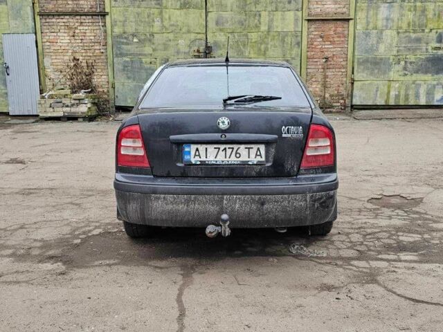 Черный Шкода Октавия, объемом двигателя 1.6 л и пробегом 210 тыс. км за 2350 $, фото 2 на Automoto.ua