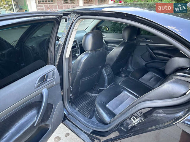 Черный Шкода Октавия, объемом двигателя 2 л и пробегом 172 тыс. км за 6700 $, фото 5 на Automoto.ua