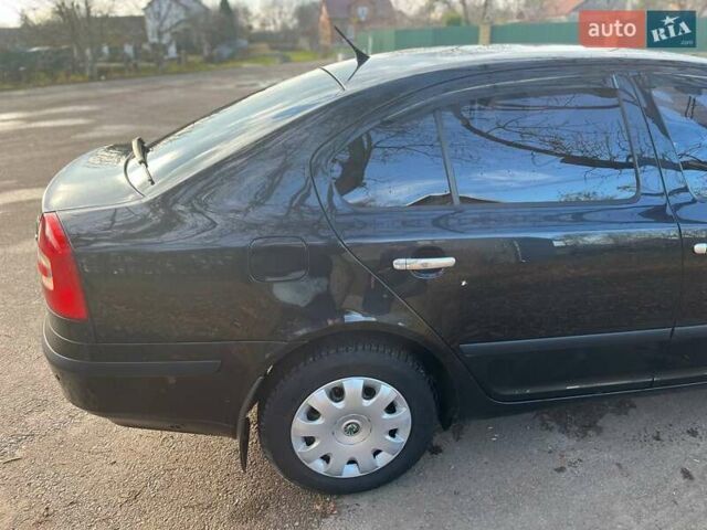 Черный Шкода Октавия, объемом двигателя 1.6 л и пробегом 210 тыс. км за 5900 $, фото 11 на Automoto.ua