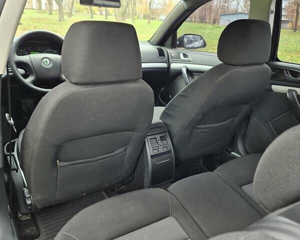 Чорний Шкода Октавія, об'ємом двигуна 1.6 л та пробігом 195 тис. км за 6600 $, фото 12 на Automoto.ua