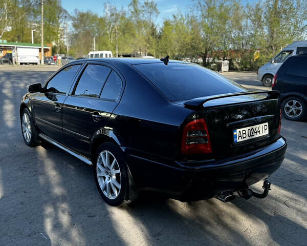 Чорний Шкода Октавія, об'ємом двигуна 1.8 л та пробігом 223 тис. км за 7700 $, фото 5 на Automoto.ua