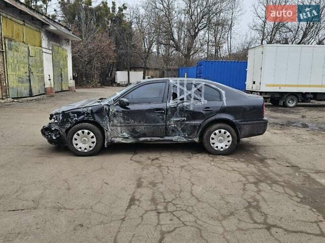 Черный Шкода Октавия, объемом двигателя 1.6 л и пробегом 210 тыс. км за 2350 $, фото 5 на Automoto.ua