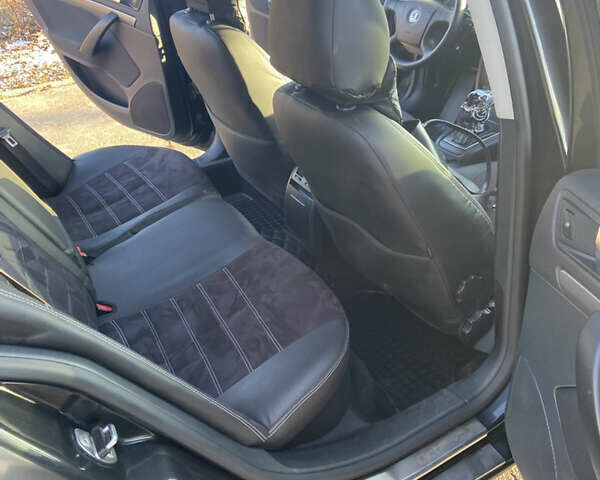 Чорний Шкода Октавія, об'ємом двигуна 1.98 л та пробігом 241 тис. км за 7500 $, фото 7 на Automoto.ua