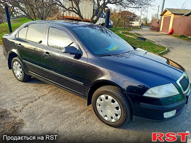 Черный Шкода Октавия, объемом двигателя 1.6 л и пробегом 240 тыс. км за 7200 $, фото 1 на Automoto.ua