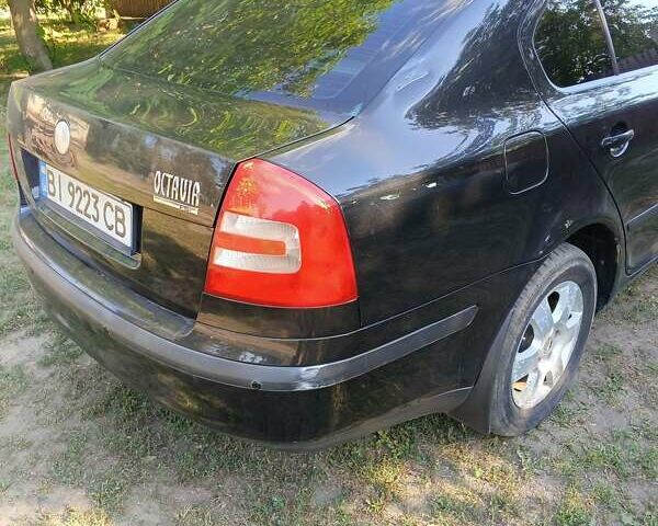 Черный Шкода Октавия, объемом двигателя 1.98 л и пробегом 298 тыс. км за 5500 $, фото 4 на Automoto.ua