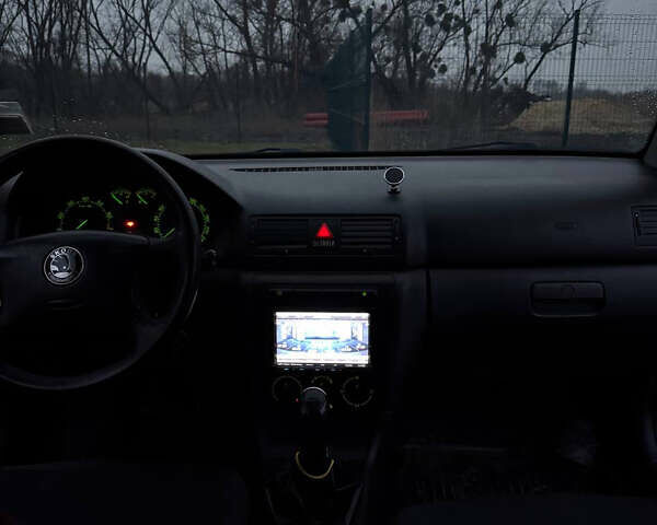 Черный Шкода Октавия, объемом двигателя 1.6 л и пробегом 245 тыс. км за 5400 $, фото 24 на Automoto.ua