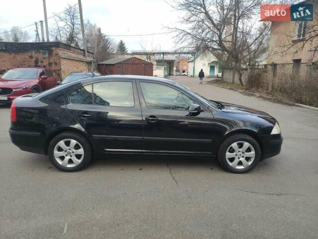 Черный Шкода Октавия, объемом двигателя 1.6 л и пробегом 198 тыс. км за 6999 $, фото 6 на Automoto.ua