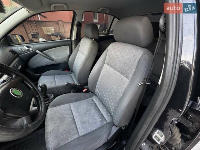 Чорний Шкода Октавія, об'ємом двигуна 1.6 л та пробігом 226 тис. км за 5600 $, фото 19 на Automoto.ua