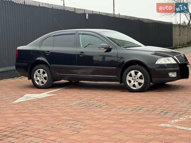 Черный Шкода Октавия, объемом двигателя 2 л и пробегом 230 тыс. км за 6950 $, фото 5 на Automoto.ua