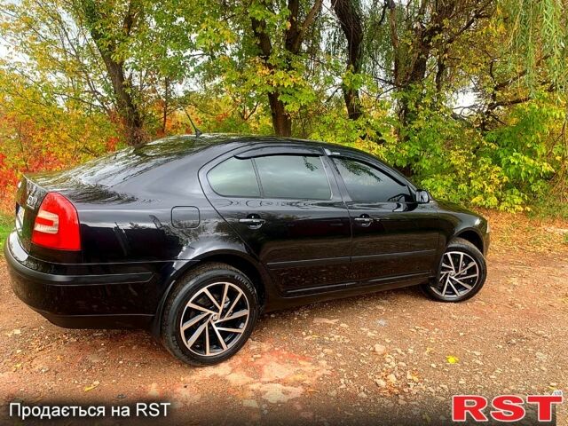 Чорний Шкода Октавія, об'ємом двигуна 2 л та пробігом 220 тис. км за 6999 $, фото 4 на Automoto.ua