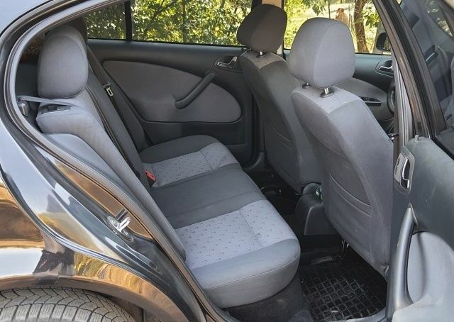 Черный Шкода Октавия, объемом двигателя 1 л и пробегом 2 тыс. км за 6000 $, фото 4 на Automoto.ua