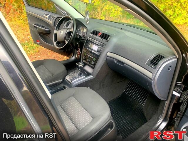 Чорний Шкода Октавія, об'ємом двигуна 2 л та пробігом 220 тис. км за 6999 $, фото 6 на Automoto.ua