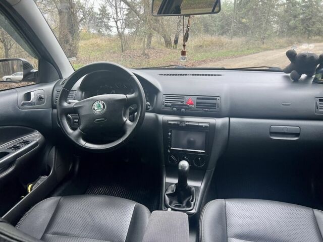 Черный Шкода Октавия, объемом двигателя 1.6 л и пробегом 286 тыс. км за 5500 $, фото 10 на Automoto.ua