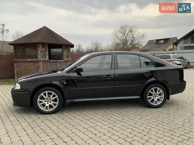 Черный Шкода Октавия, объемом двигателя 1.6 л и пробегом 151 тыс. км за 6100 $, фото 2 на Automoto.ua