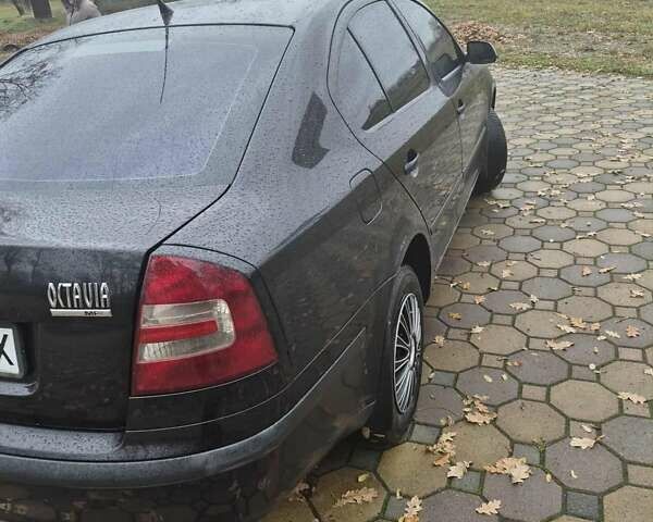 Черный Шкода Октавия, объемом двигателя 1.6 л и пробегом 315 тыс. км за 6300 $, фото 11 на Automoto.ua