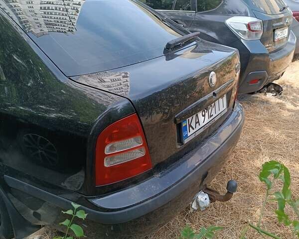 Черный Шкода Октавия, объемом двигателя 1.6 л и пробегом 431 тыс. км за 5500 $, фото 10 на Automoto.ua