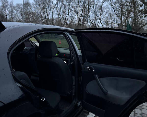 Черный Шкода Октавия, объемом двигателя 1.6 л и пробегом 245 тыс. км за 5400 $, фото 27 на Automoto.ua